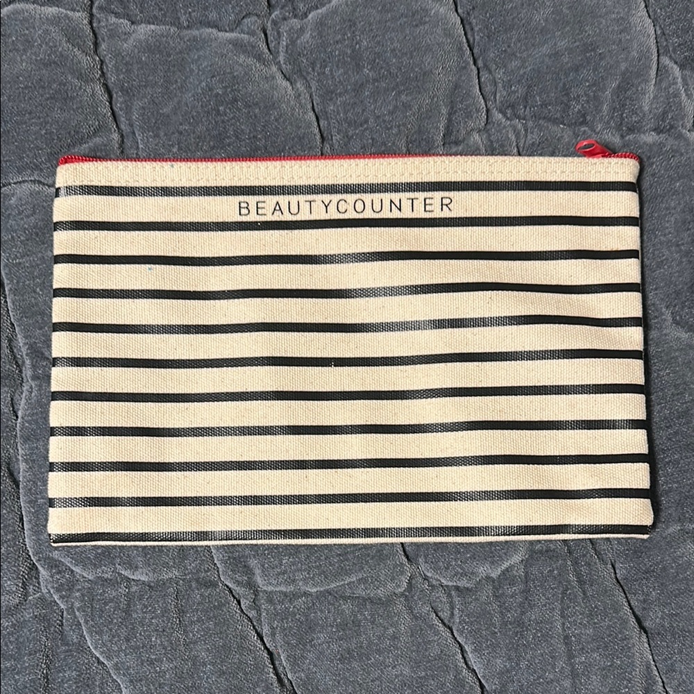 Beautycounter Navy and Cream Striped Pouch with Red Zipper
